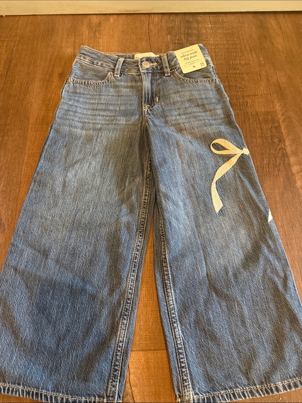 Abercrombie Wide Leg Girls Jeans in Washed Blue with Bow Detail